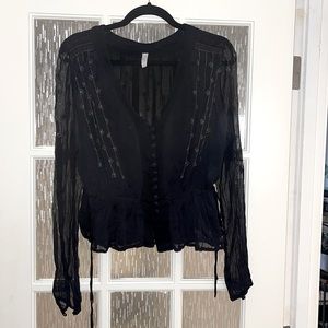 Free people, sheer ish black top.